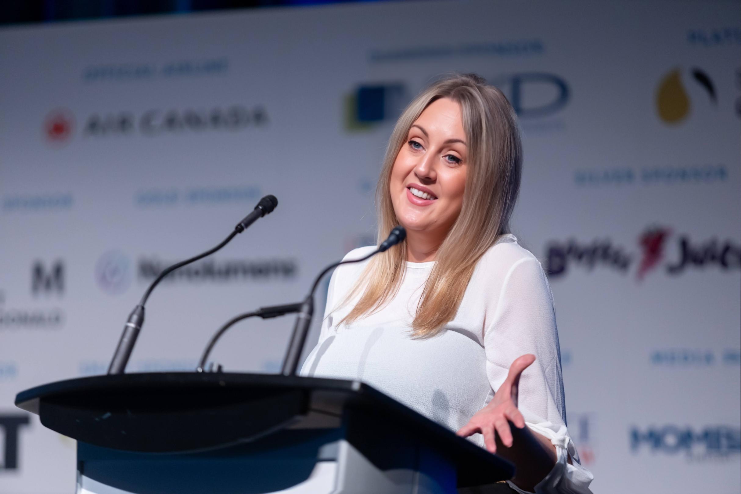 Victoria Wallace speaking at the Smart Airports 2023 conference in Edmonton, Canada.